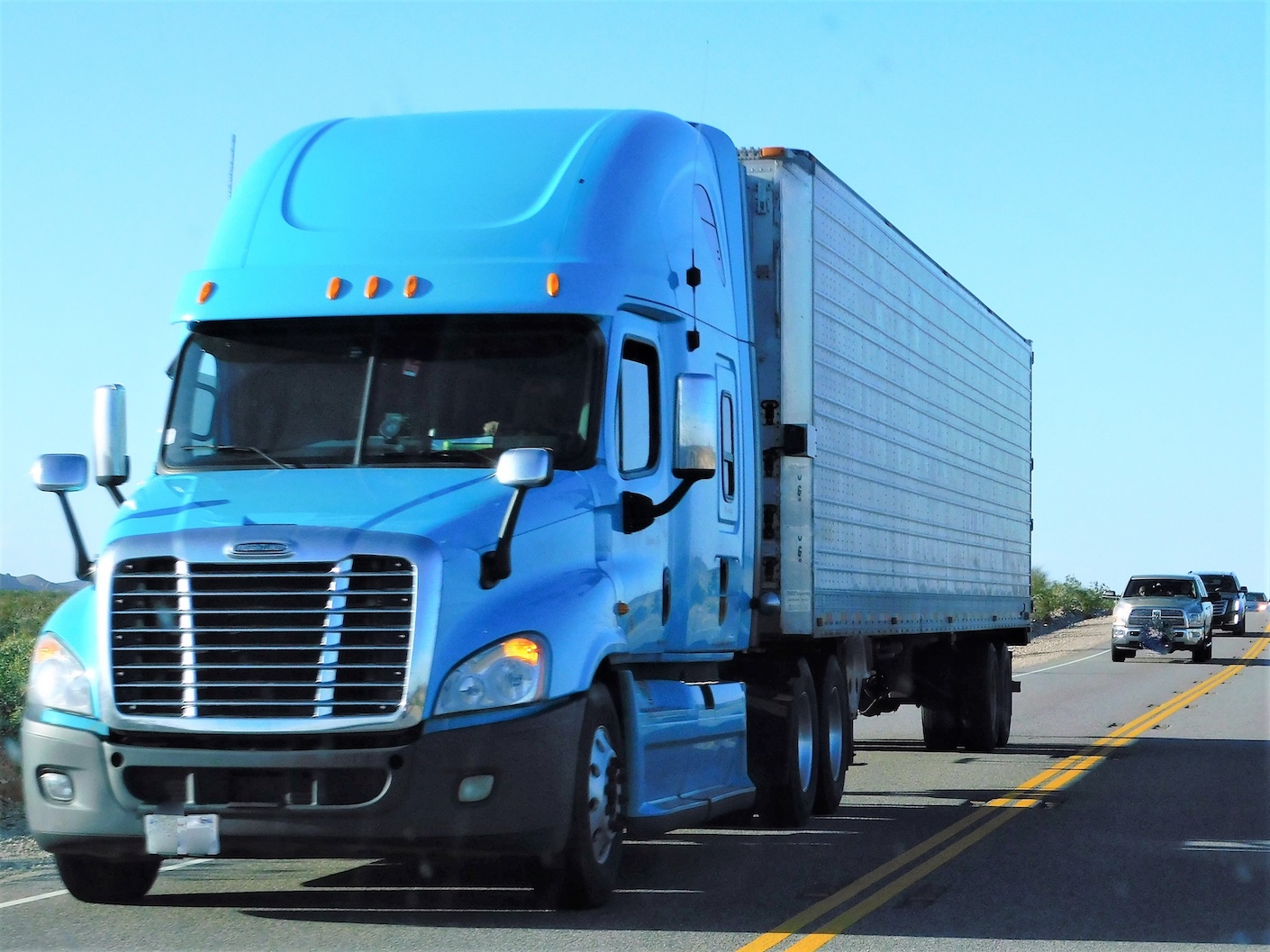 //truckhousepa.com/wp-content/uploads/2021/06/trucking-bright-blue-big-rig-2022-11-08-05-57-27-utc.jpg